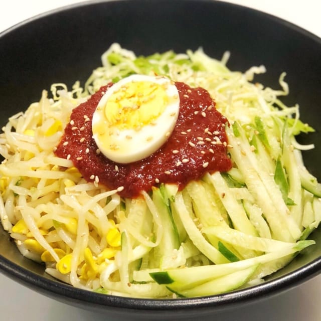 E 8. Jjolmyun (spicy cold chewy noodles).