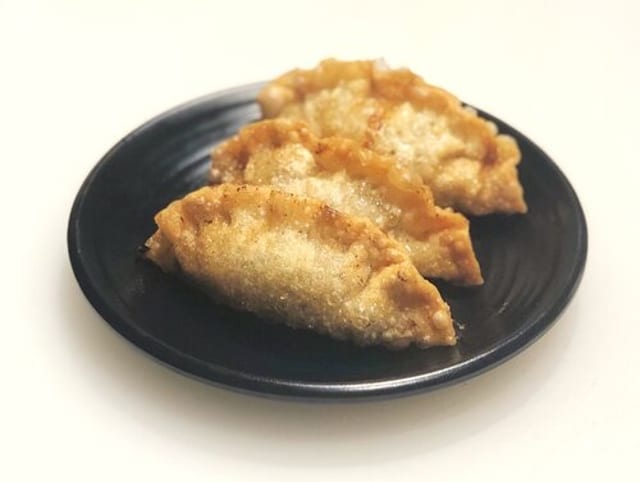 A2. Dumplings (3 Pieces).